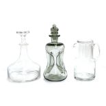 A vintage smoked glass Holmegaard style 'cluck cluck' decanter, 26cmH; a ships decanter and a