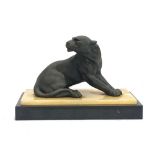 An Art Deco style bronze sculpture of a Puma on an onyx base, 27cmW