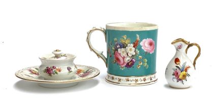 A Dresden inkwell with hand painted floral design, 15cmD; a 19th century hand painted mug; and a