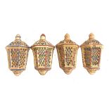 Interior design interest: a set of four glazed terracotta pierced candle holders/walls scones, 39cmH