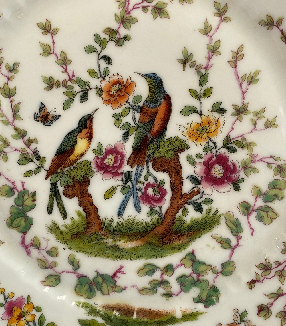 A set of nine early 20th century plates, decorated with birds in trees, heightened in gilt, - Image 2 of 3