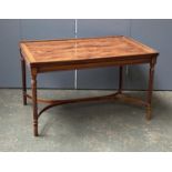 A yew veneered coffee table, on fluted tapering legs, 82x51x48cm