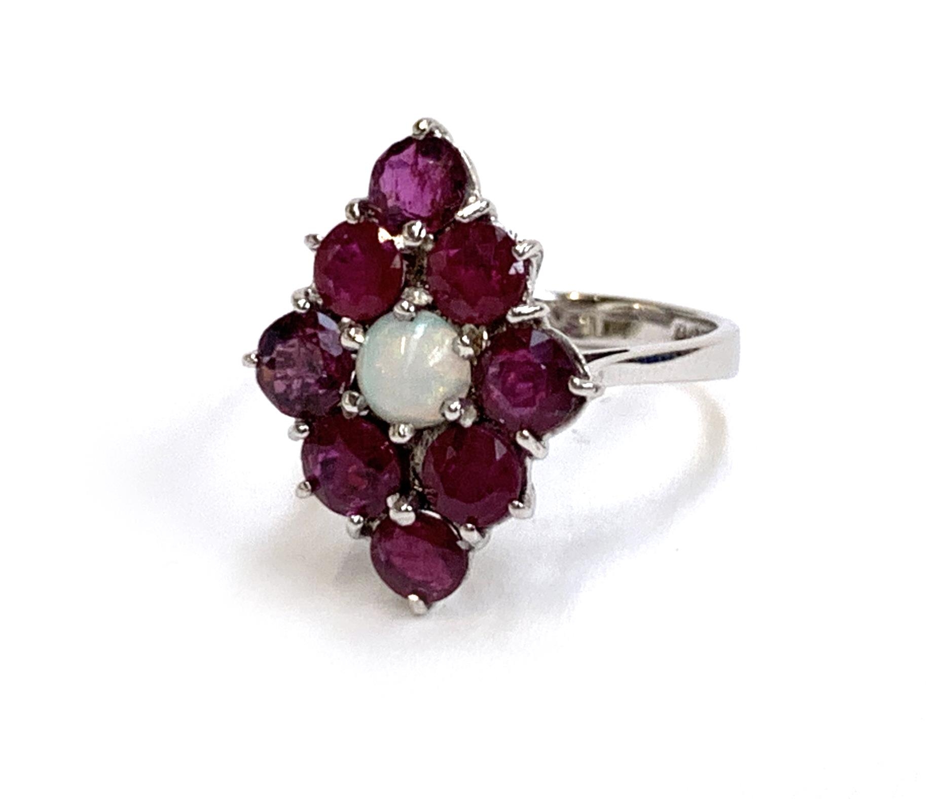 A 9ct white gold ring set with a navette form cluster of rubies and a central opal, size J, 3.2g - Image 2 of 3