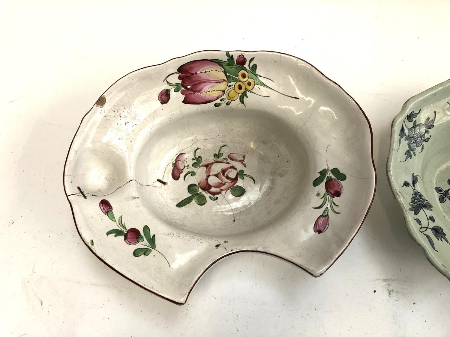 Two ceramic shaving dishes, both with floral designs, with staple repairs, 30cmW & 33cmW (af) - Image 2 of 5