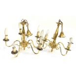 A pair of five arm gilt metal chandeliers, approx. 55cmW; together with one smaller five arm