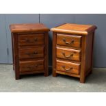 A pair of hardwood three drawer bedside cabinets, 42x35x58cmH