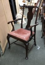 A Georgian mahogany splatback open armchair, carved cabriole legs with pad feet, H stretcher, 65cmW