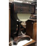 A Regency dropleaf sewing table, two drawers over pullout silk work box, on a quatrefoil base,