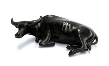 A bronze figure of a water buffalo, approx. 24cmL