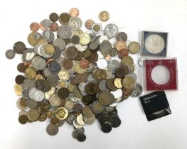 A quantity of British and World coins to include Charles and Diana commemorative coin, banknotes,