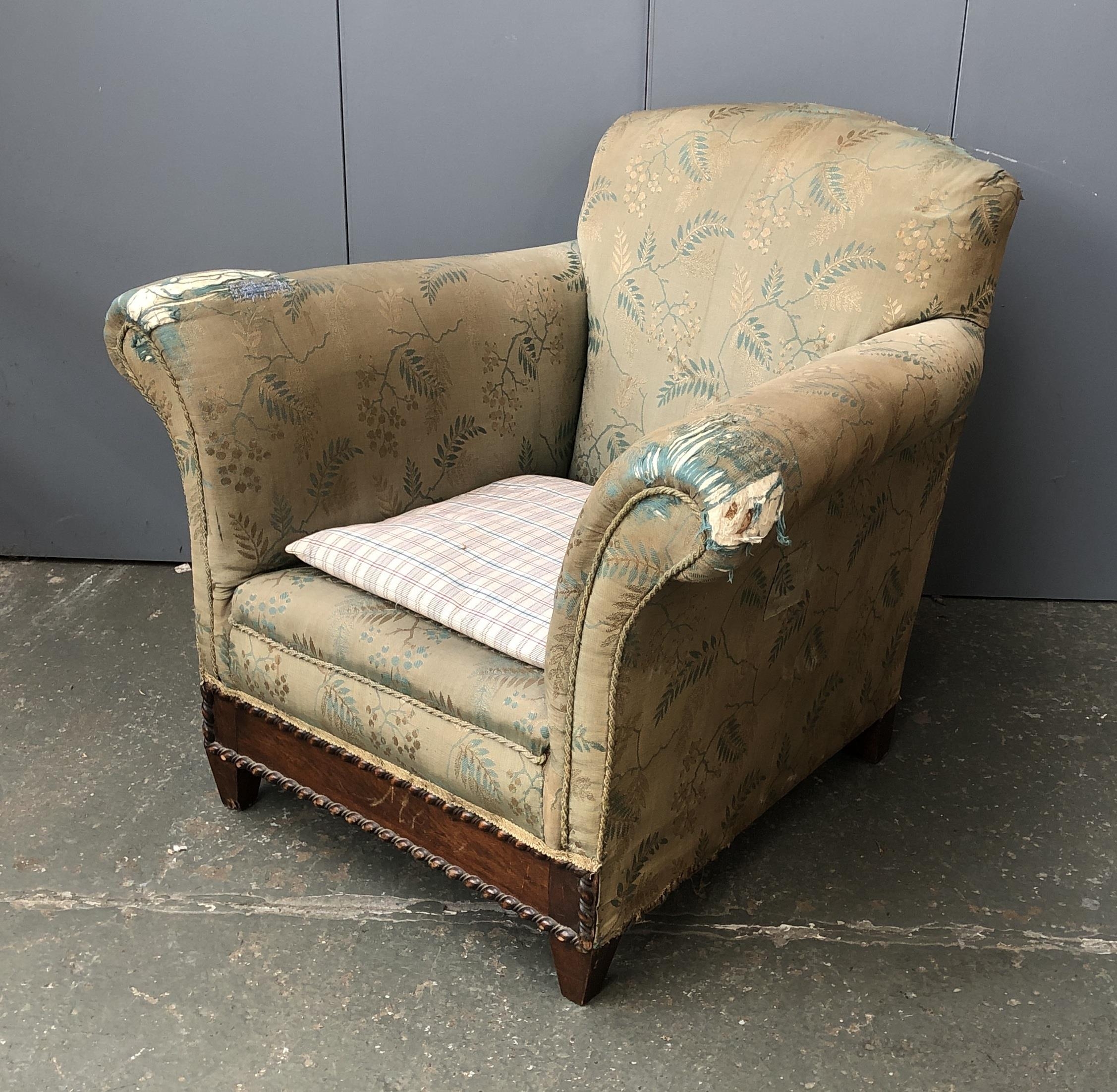 A deep country house armchair, 88cmW