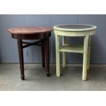 A green painted circular occasional table with undershelf, tooled leather skiver, 59x70cmH; together