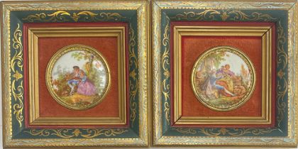 A pair of framed Limoges style porcelain roundels depicting courting continental couples, the