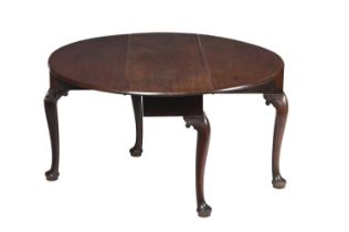 A George II mahogany oval drop leaf dining table circa 1750, 127cm long, 125cm wide (open), 72cm