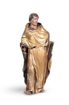 A 19th century carved, painted and giltwood figure of a monk, portrayed with tonsured hair and