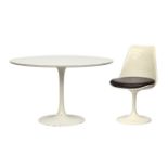 A white Knoll Eero Saarinen 'Tulip' style circular dining table with white formica top, 121cm diamet