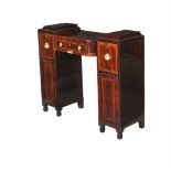 A Regency mahogany and crossbanded sideboard, of small proportion, formed of two cavetto moulded