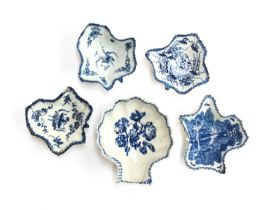 Four 18th century leaf shaped porcelain pickle dishes: two Worcester, painted in 'The Pickle Leaf