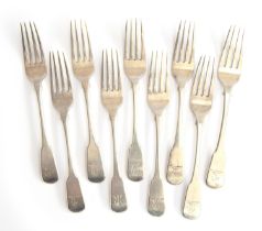 A set of nine crested fiddle pattern dessert forks by Joseph Hicks, Exeter 1821, 11ozt