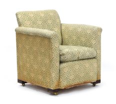 A neat early 20th century armchair by Howard & Sons, the loose cover over original H&S ticking,