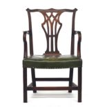 A George III mahogany splatback open armchair, leather upholstered stuffover seat, raised on moulded