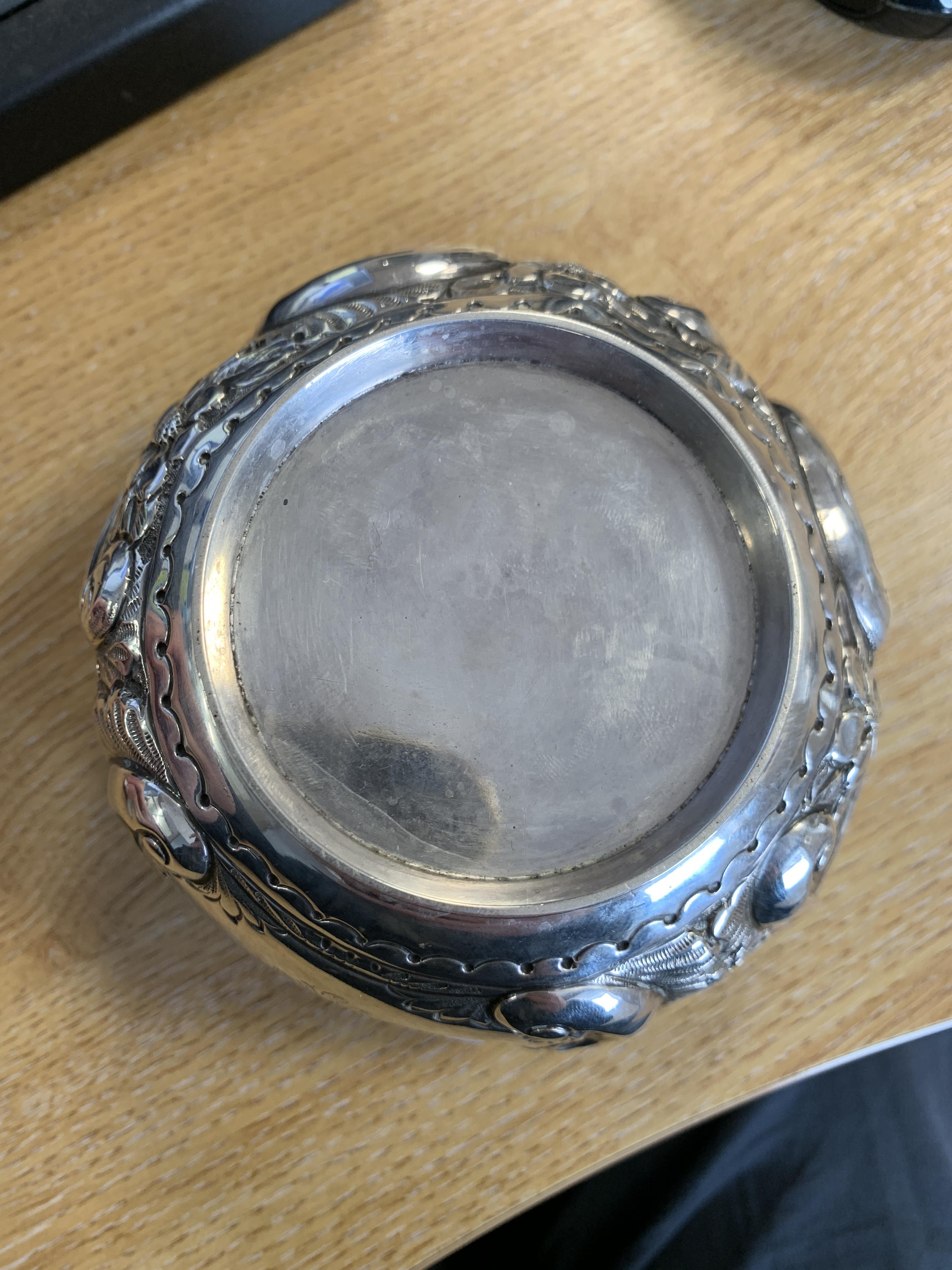 A late Victorian silver bowl by Norton & White, Birmingham 1899, heavily chased with scrolls and - Image 3 of 4