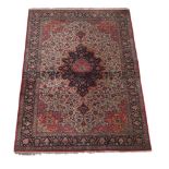 A Tabriz carpet, approx. 302x198cm