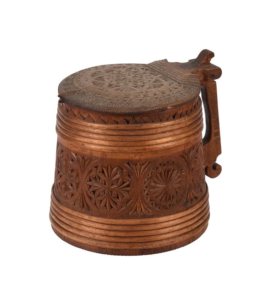 A Scandinavian carved wood tankard, c.1900 , of typical form with hinged lid above the tapered - Image 2 of 3