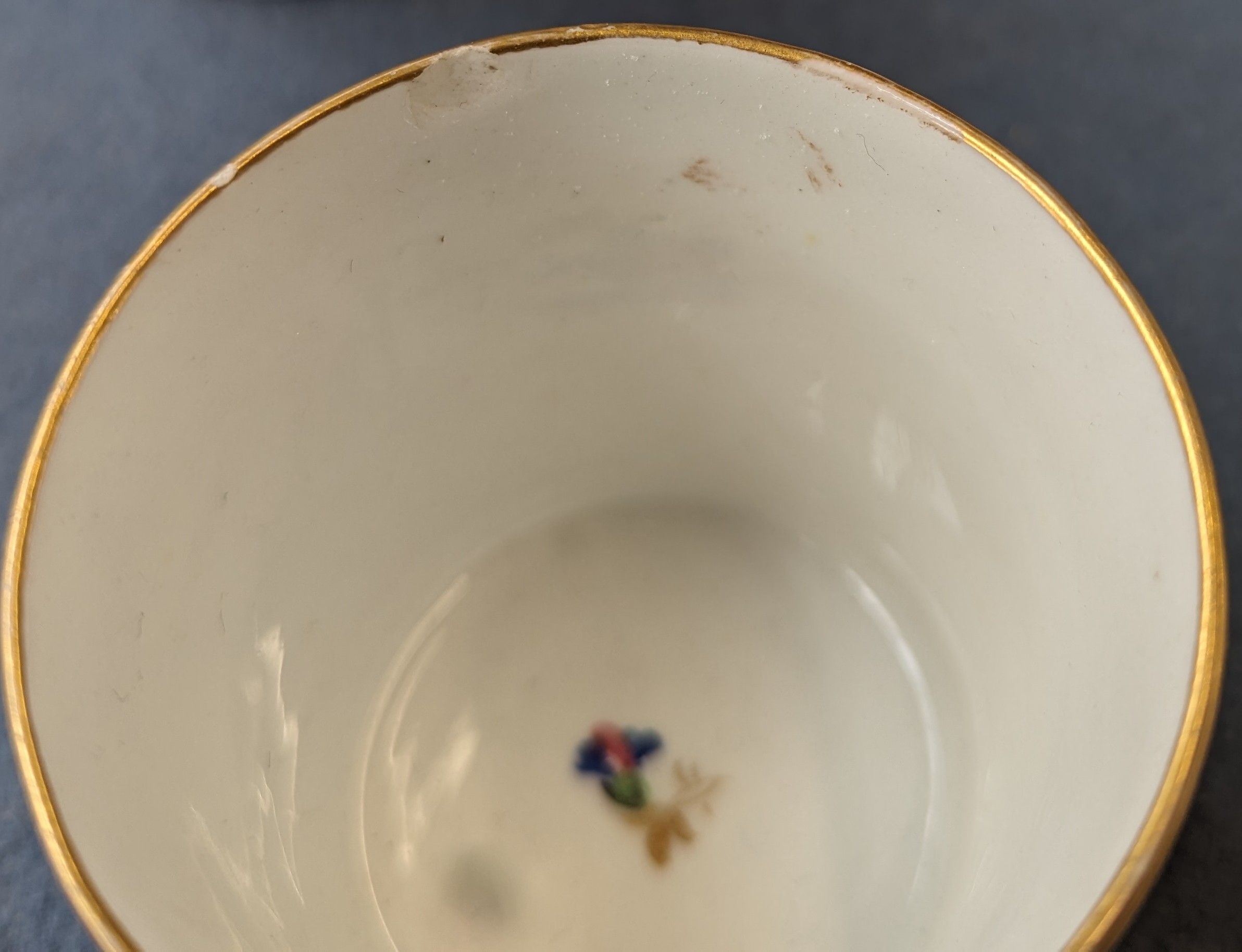 An early 19th century Derby named view teacup, coffee cup and saucer, the cups hand painted with a - Image 11 of 12