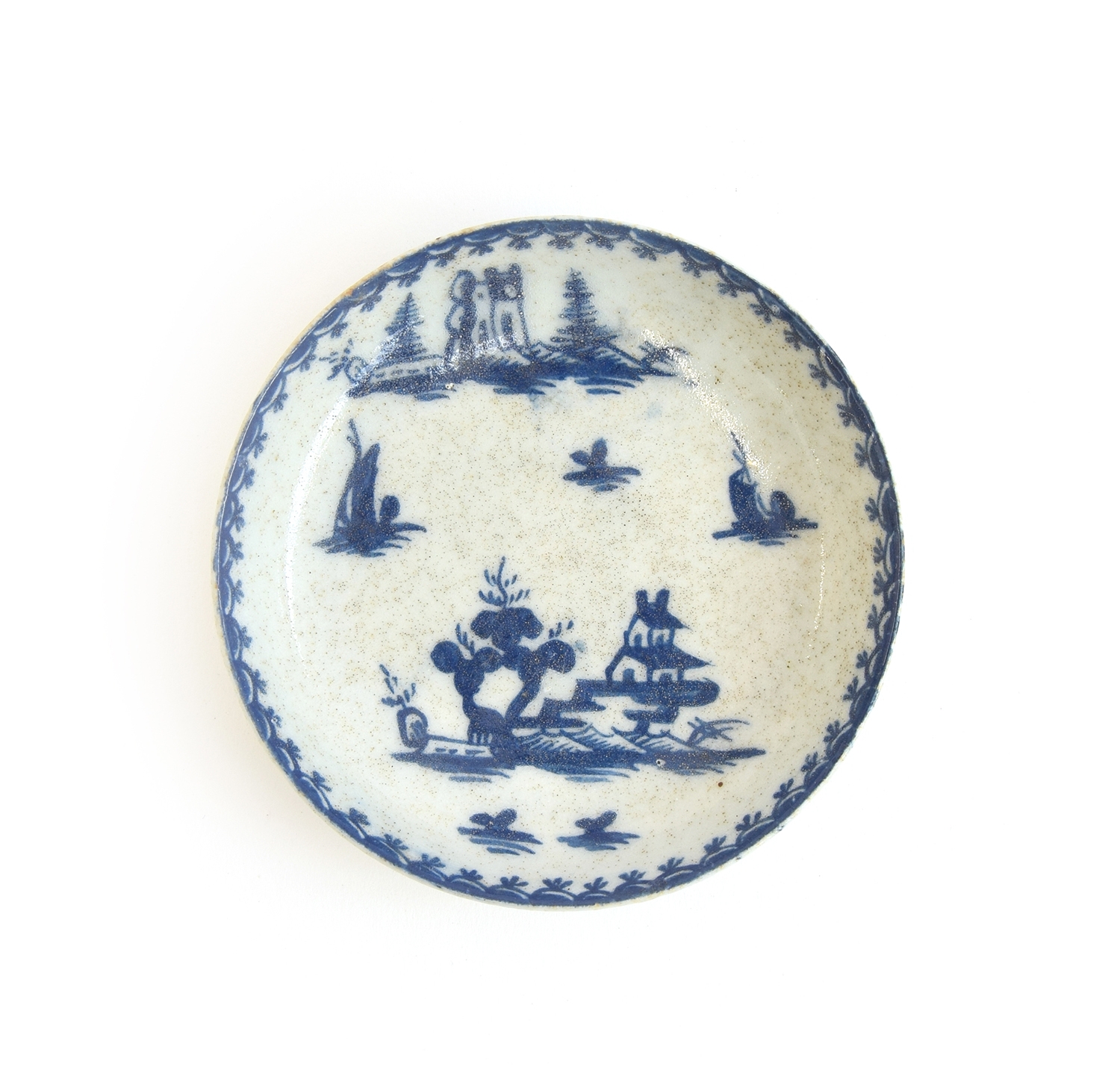 A scarce 18th century Lowestoft toy or miniature saucer c.1765, painted with a Pagoda scene within a