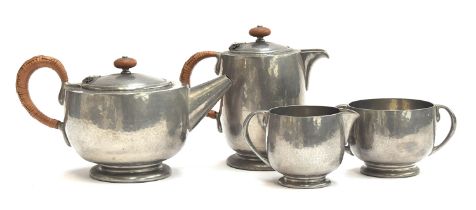 A Liberty Tudric pewter teapot, 13cm high, coffee pot, 15cm high, sugar bowl and milk jug