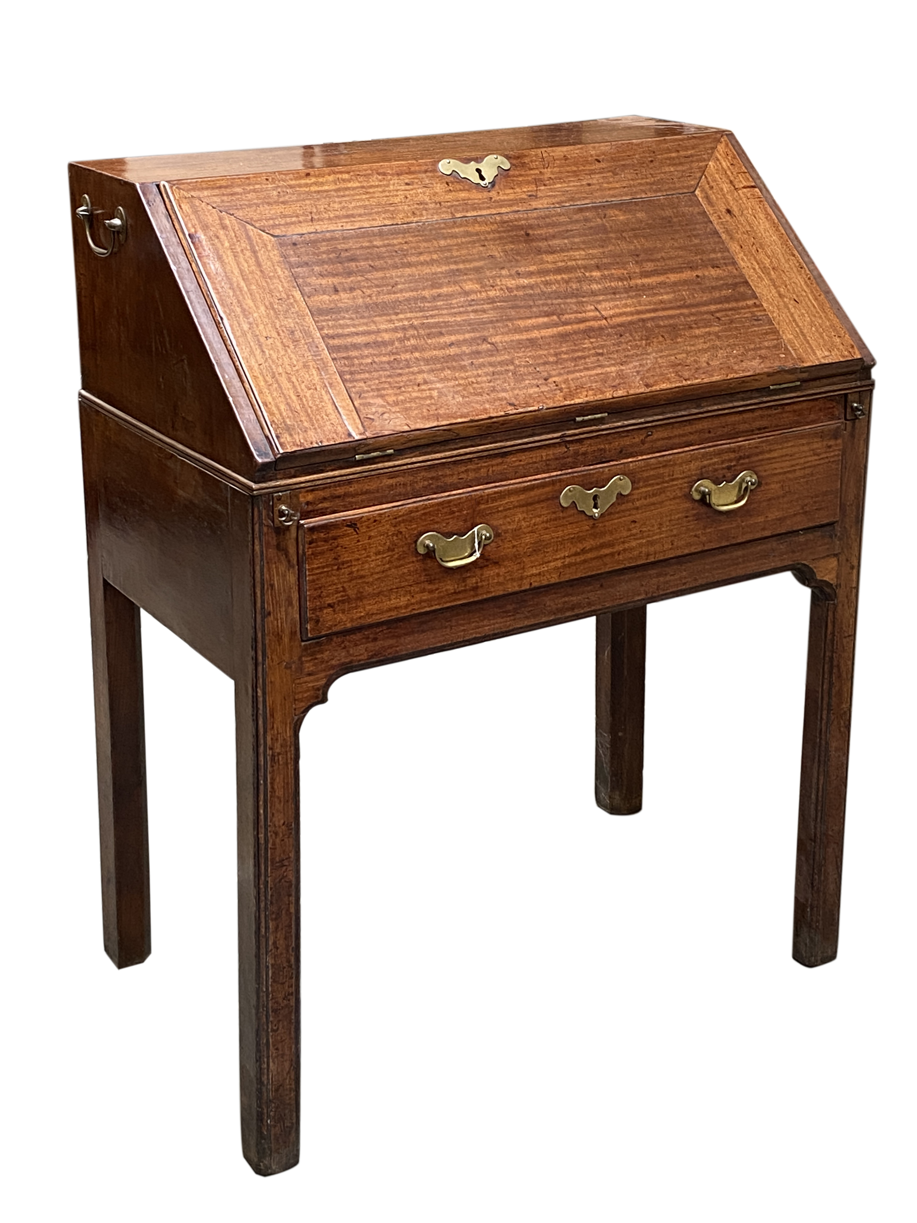 A George II mahogany bureau, the fall front opening to a fitted interior, above a single drawer,