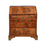 An early 18th century walnut bureau, 88cm wide, 56cm deep, 99cm high