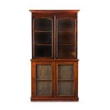 A Victorian mahogany bookcase, the four glazed doors enclosing shelves, the lower doors lined with