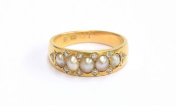 A Victorian 18ct gold ring set with split pearls and diamonds, size L 1/2, 4.7g