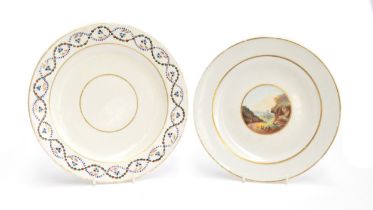 Two W(***) porcelain plates, one hand painted with a landscape castle scene, heightened in gilt,