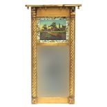 An American Federal period giltwood mirror, with reverse painting on glass scene of a cottage (