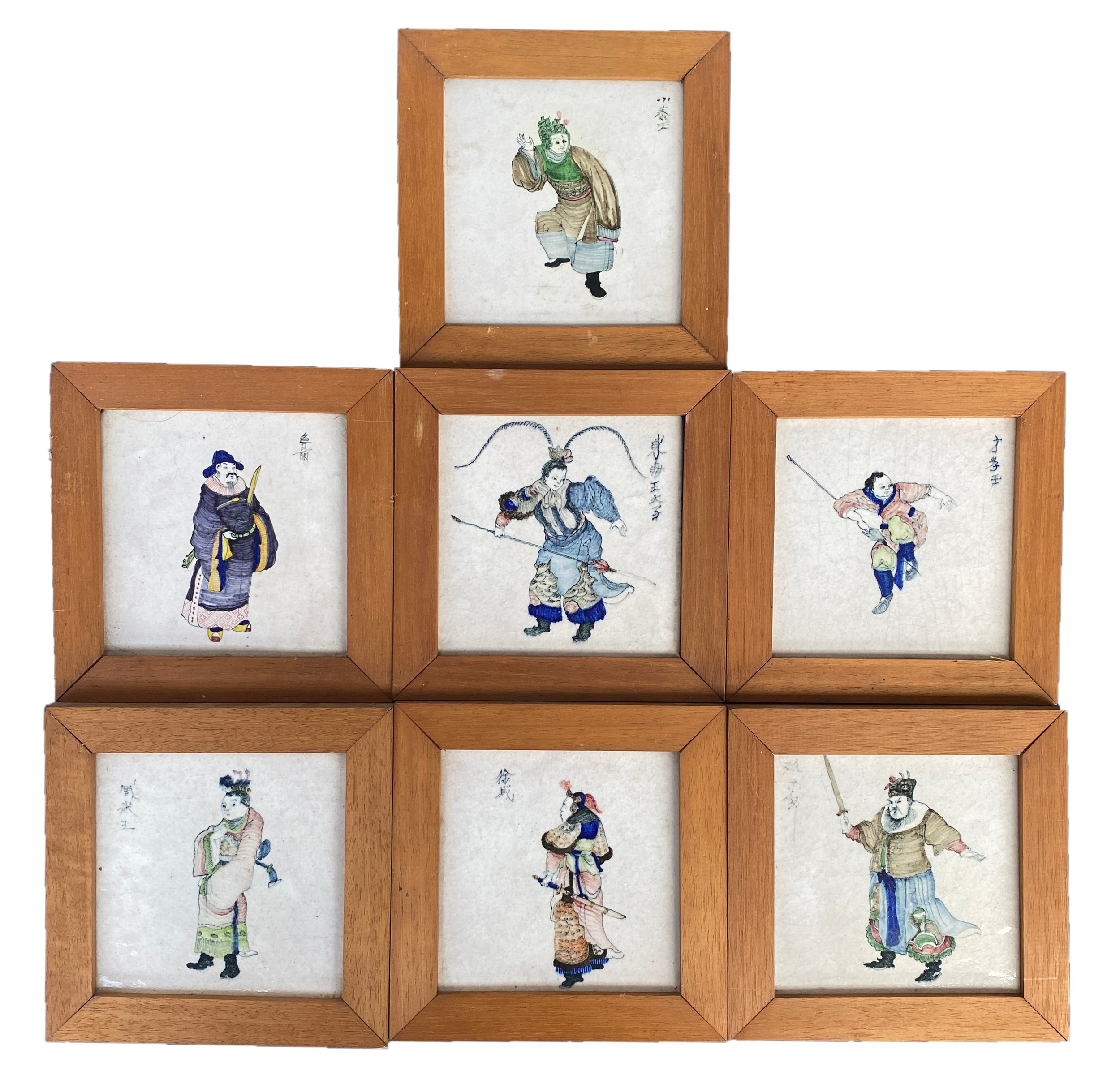 A set of seven Dutch Makkum delft tiles c.1930, likely manufactured by Tichelaar, depicting