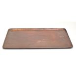 An Arts and Crafts Newlyn copper tray, stamped Newlyn, 55x40cm