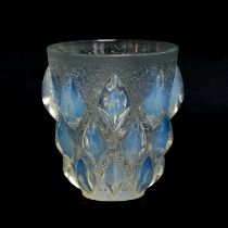 A Rene Lalique opalescent glass 'Rampillon' vase, tapered form with lozenge nodes on a foliate