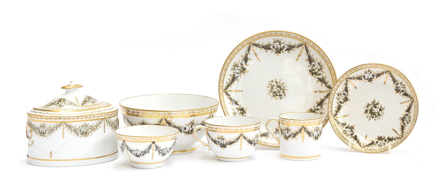 A 19th century Copeland Spode part tea service, hand painted with black floral swags heightened in