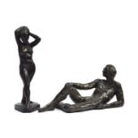 A composition bronze figure of a standing female nude, signed G. Brown, 1946, 31cm high; together