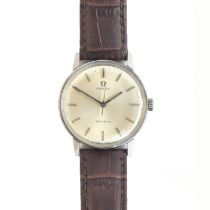 An Omega Geneve manual wind gent's steel wrist watch, cal. 601, the dial with baton hour markers,