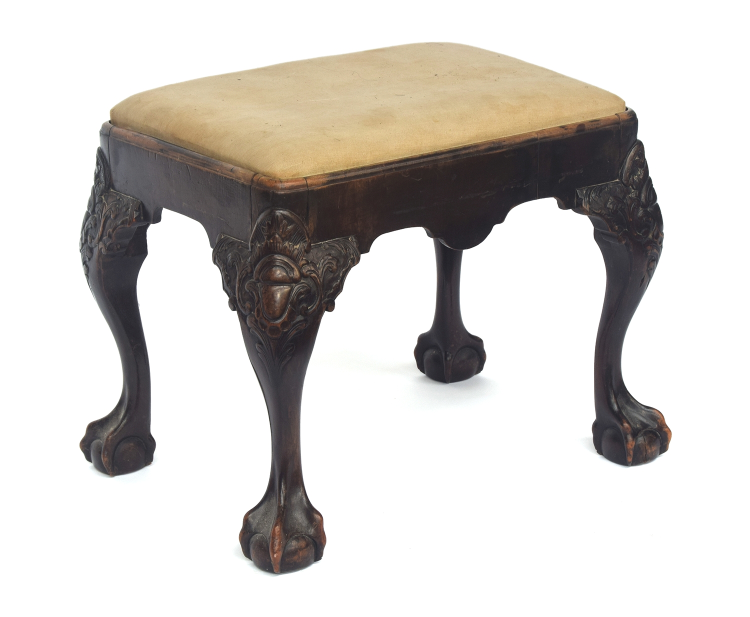 A footstool in 18th century style with cabriole legs and ball and claw feet58cm wide, 42cm deep,