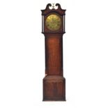 A George III oak long case clock, broken swan neck pediment surmounted by a gilt metal eagle, the