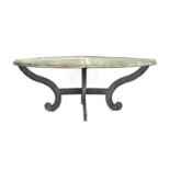 A substantial bronze garden table, four part trellis top, raised on scrolling legs joined by a