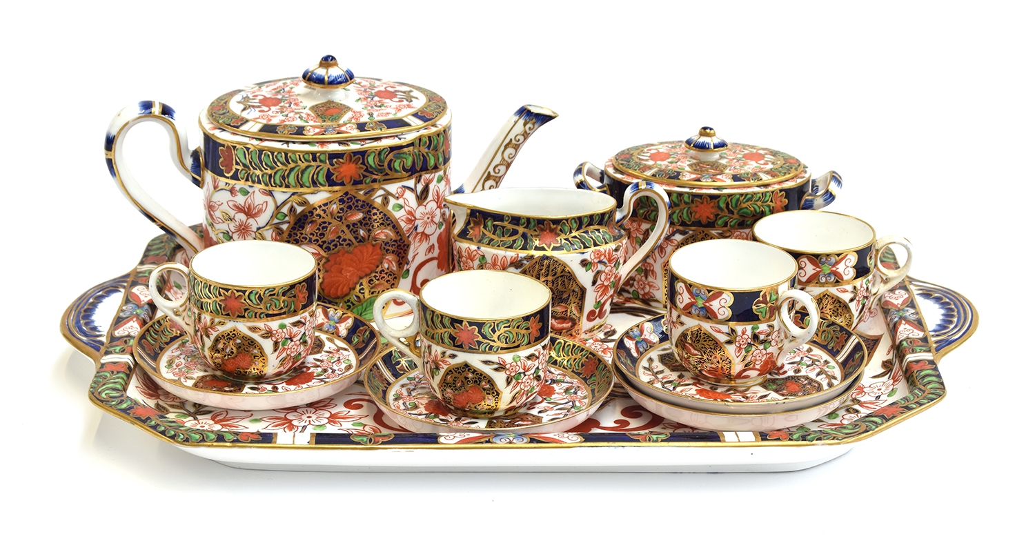 A 19th century Royal Crown Derby cabaret set in Imari pattern 198, date marks for 1884, comprising