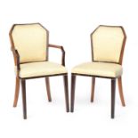 A set of eight French Art Deco maccasar ebony veneer dining chairs, two carvers, mahogany framed,