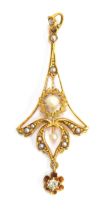 An American Belle Epoque 10ct gold lavalier pendant, of swag form with a central pearl surrounded by