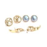 Three pairs of pearl earrings: a pair of 9ct gold and grey mabe pearl studs, 1.4cm diameter; a